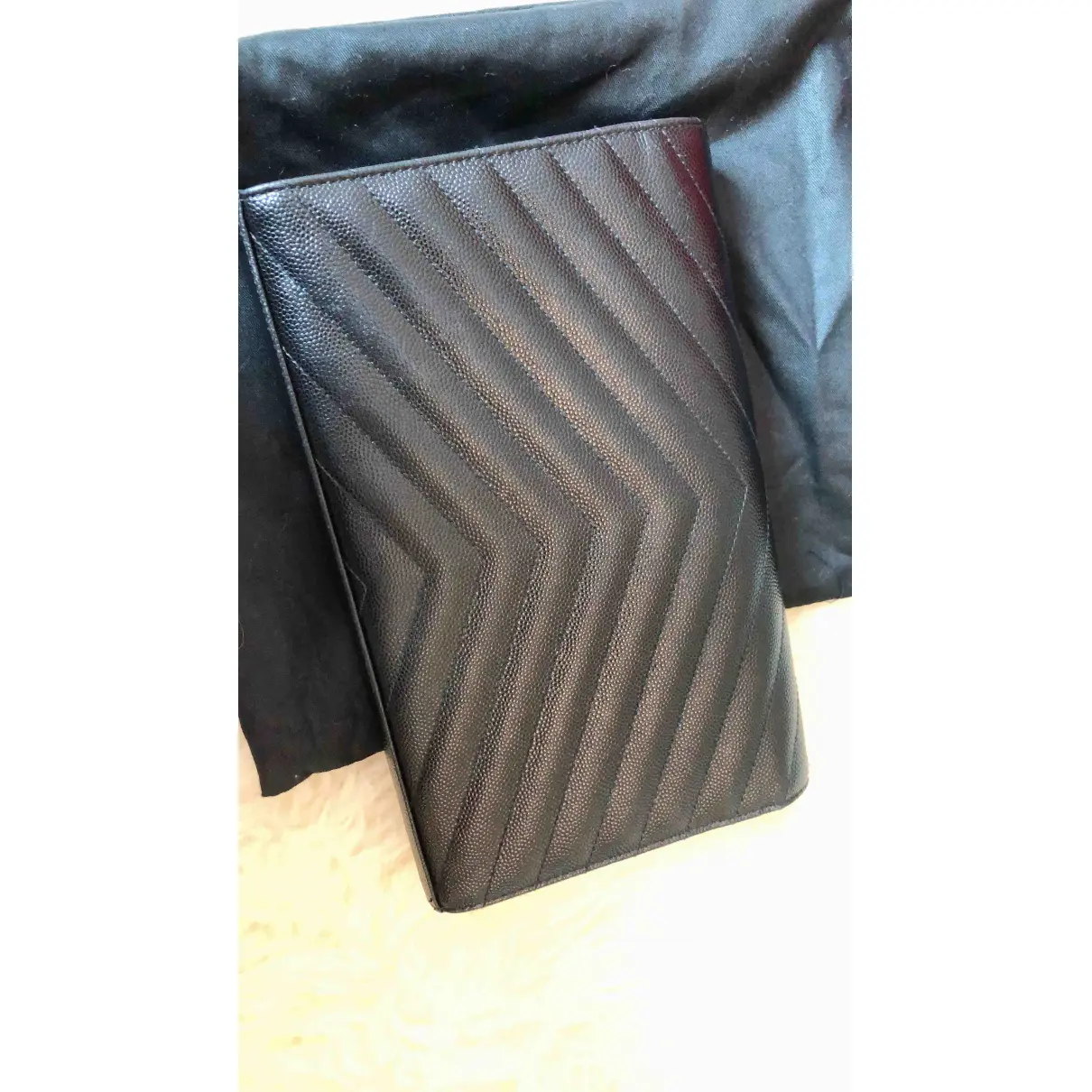 Buy Saint Laurent Portefeuille enveloppe leather clutch bag online