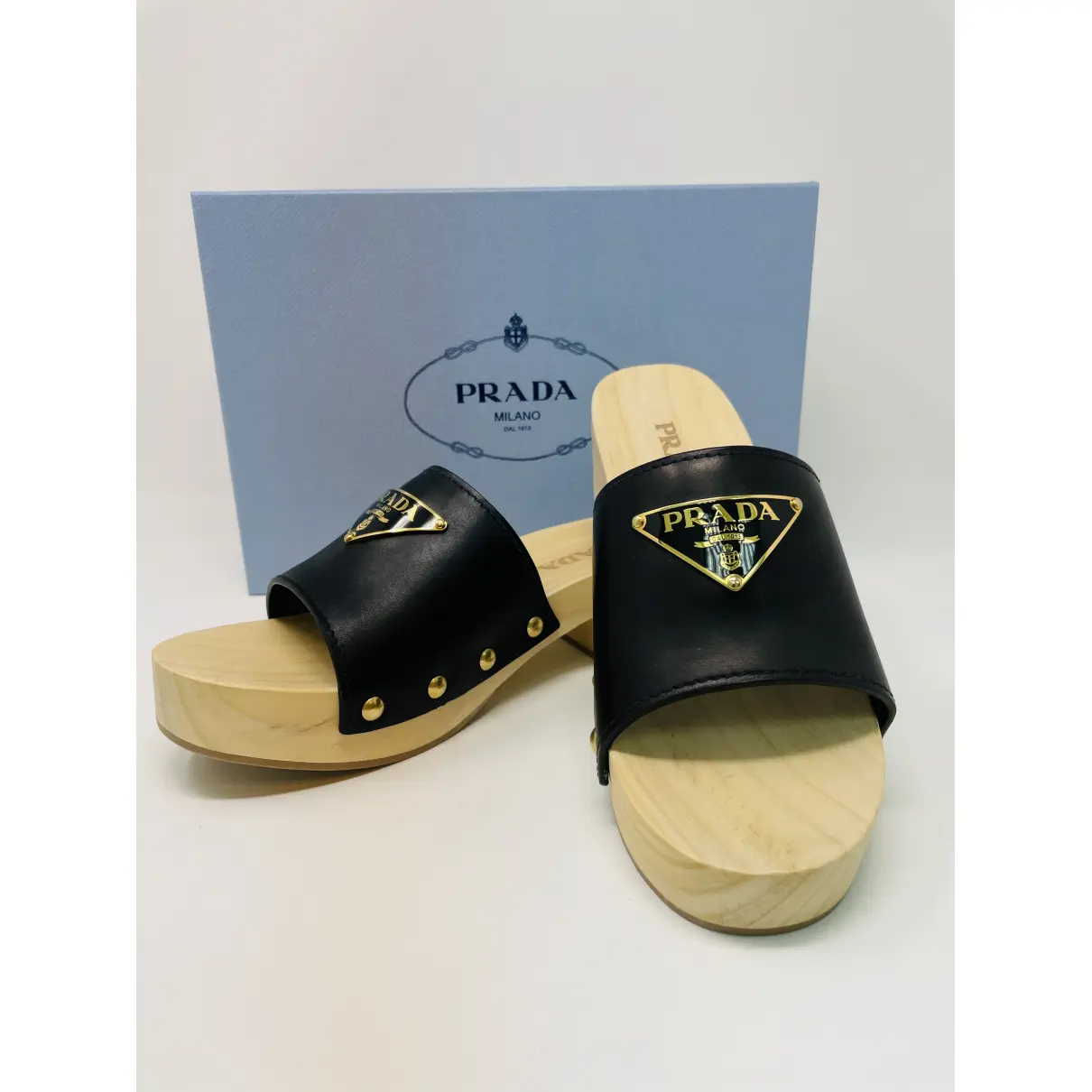 Buy Prada Leather mules & clogs online