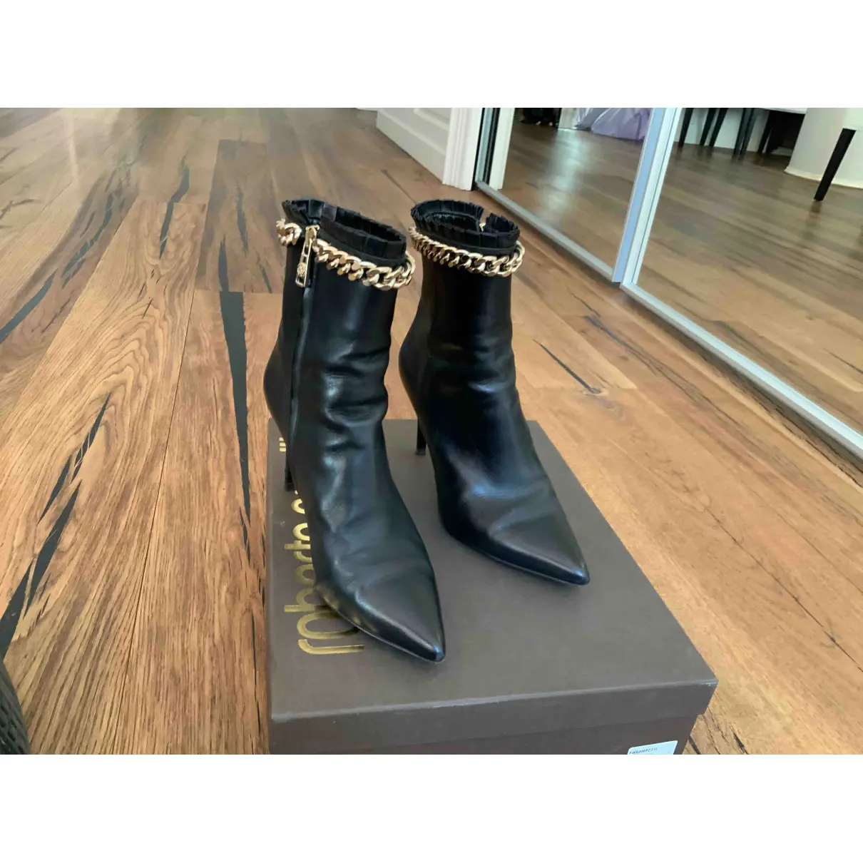 Buy Roberto Cavalli Leather ankle boots online