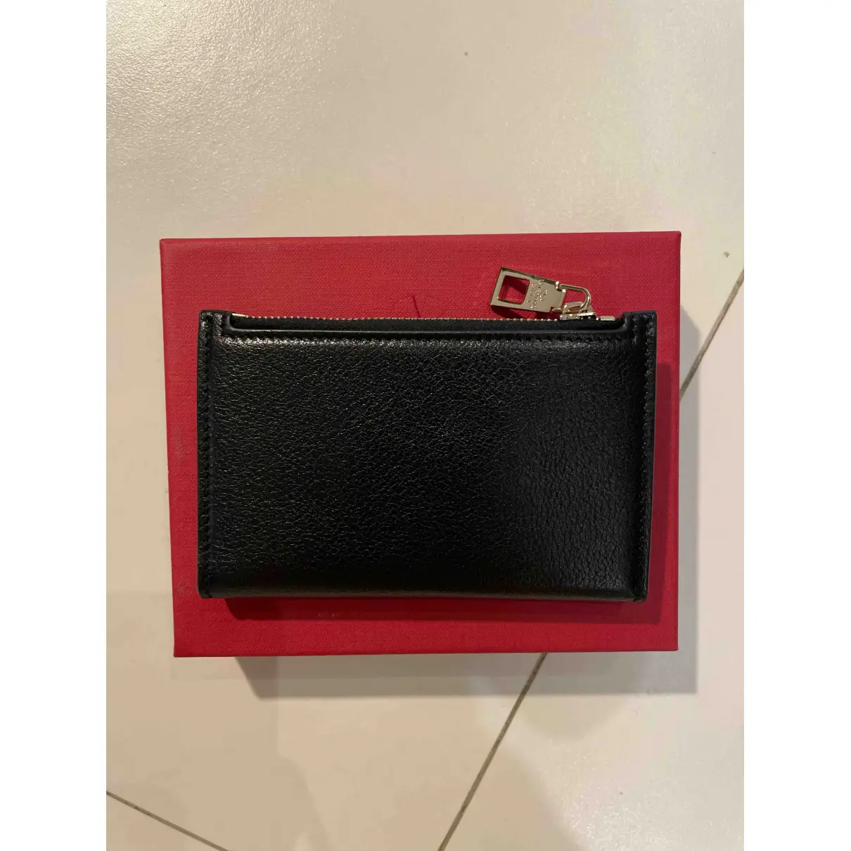 Buy Valentino Garavani Rockstud leather wallet online