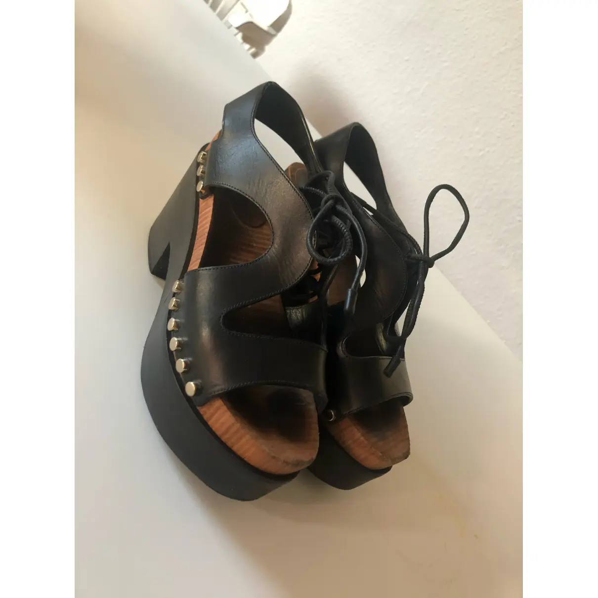 Buy Balenciaga Round leather mules & clogs online