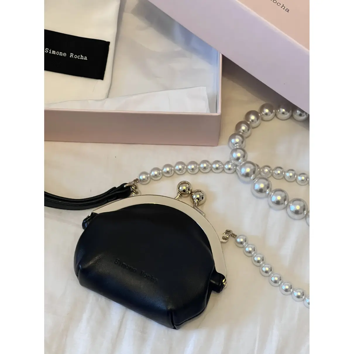 Buy Simone Rocha Leather clutch bag online