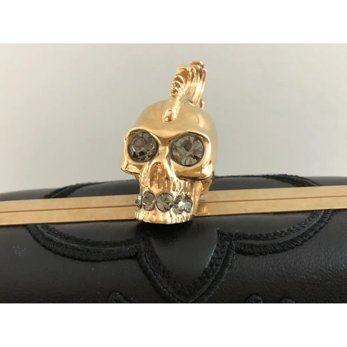 Buy Alexander McQueen Skull leather clutch bag online
