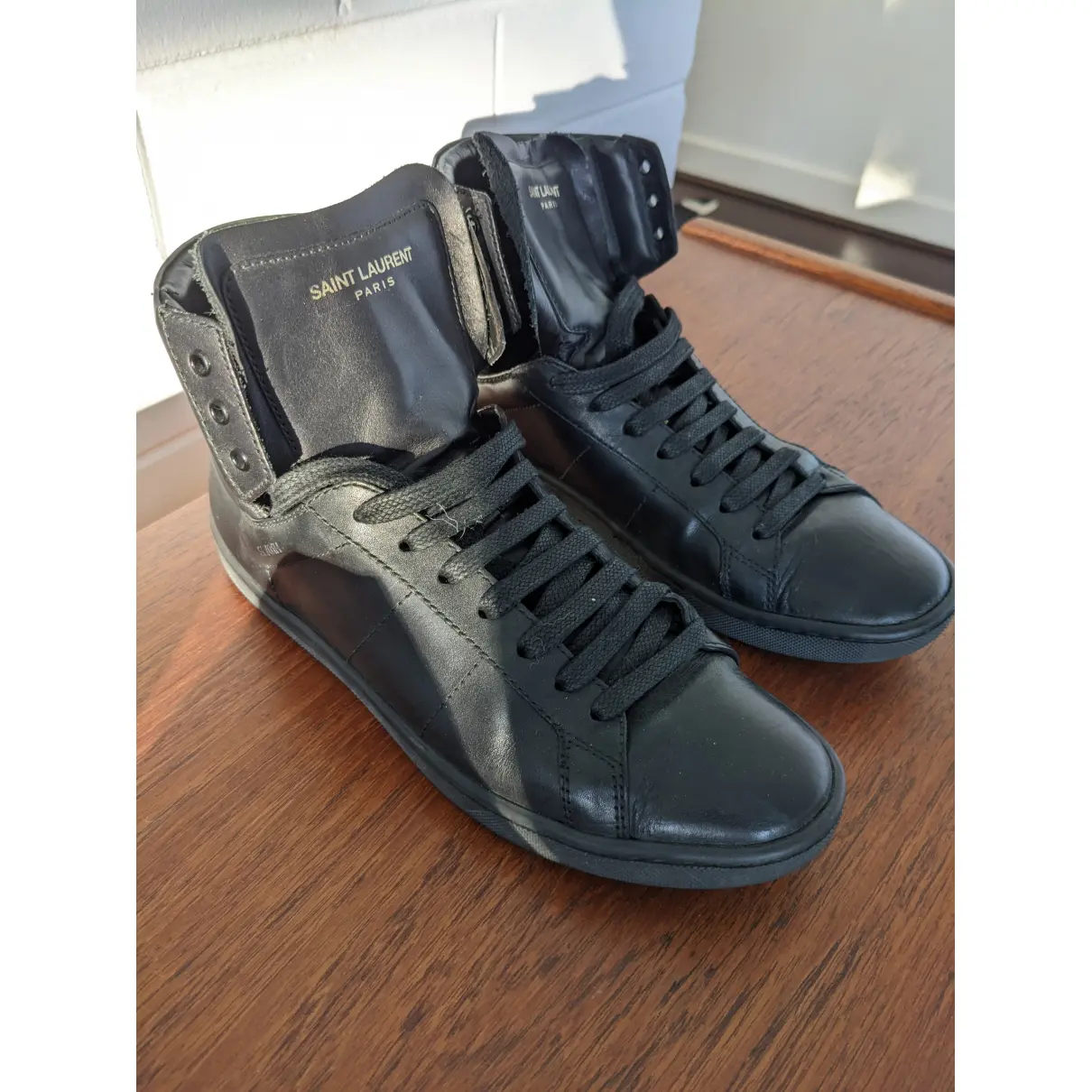 Buy Saint Laurent SL/01 leather trainers online