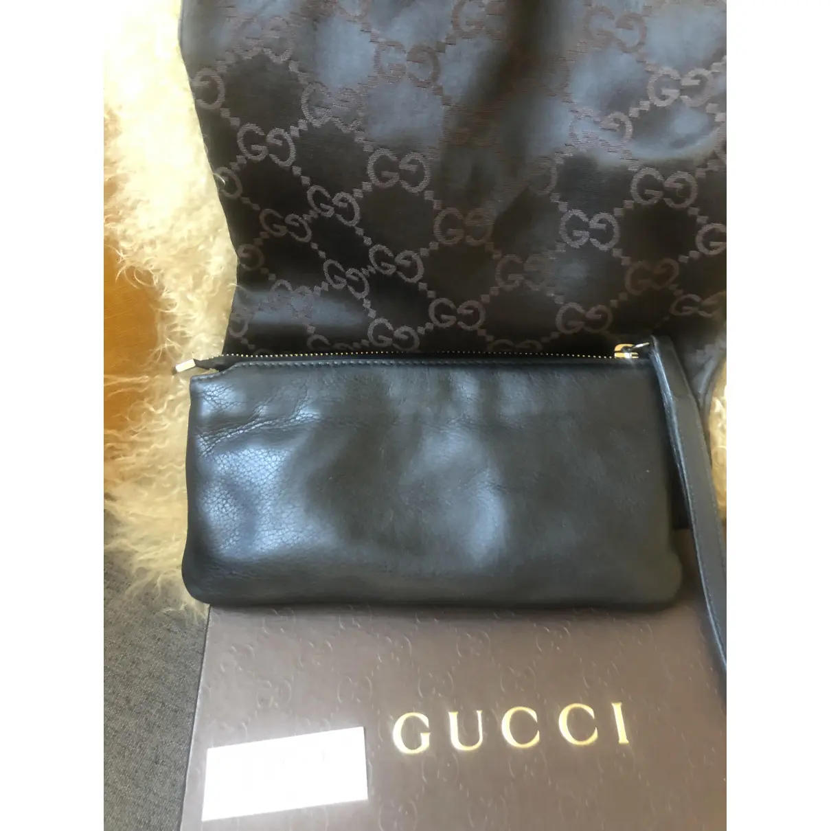 Buy Gucci Soho leather clutch bag online