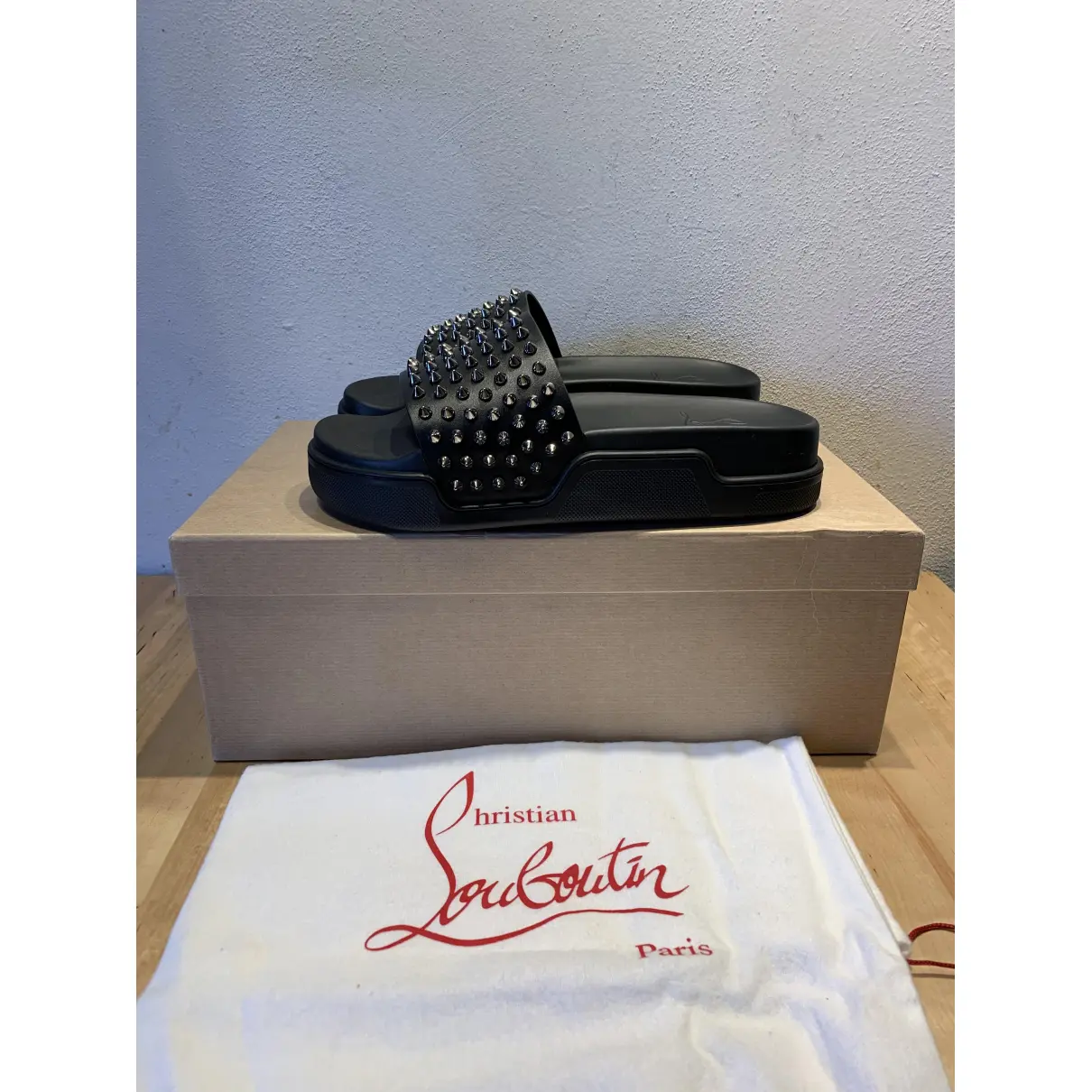 Buy Christian Louboutin Spikaqueen leather mules online