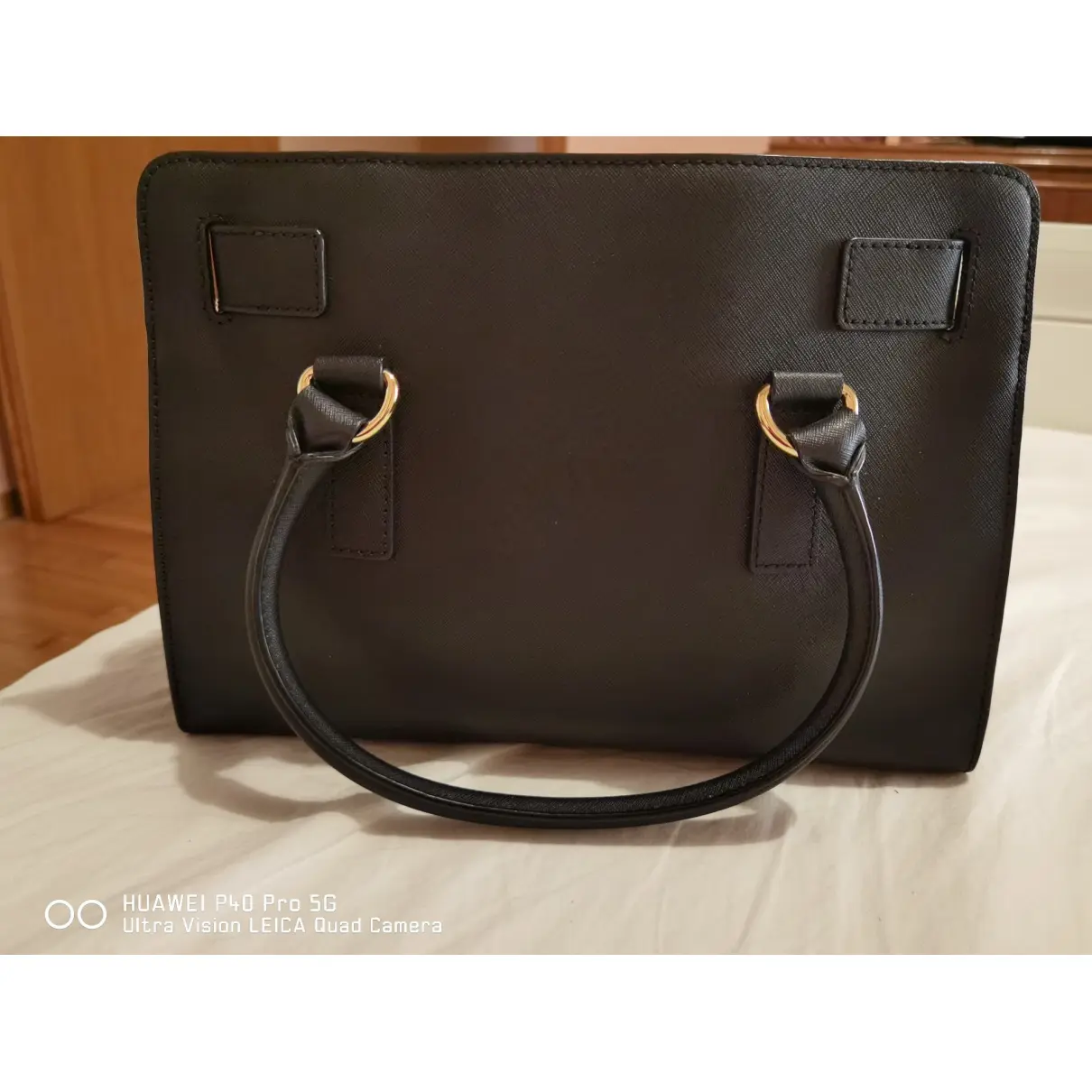 Buy Michael Kors Sutton  leather clutch bag online