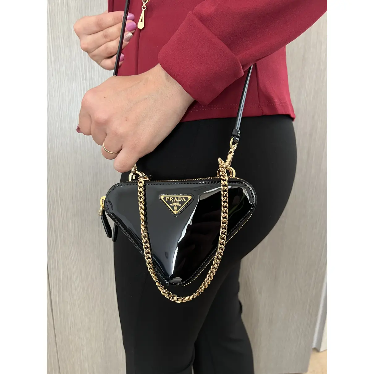 Triangle leather mini bag Prada