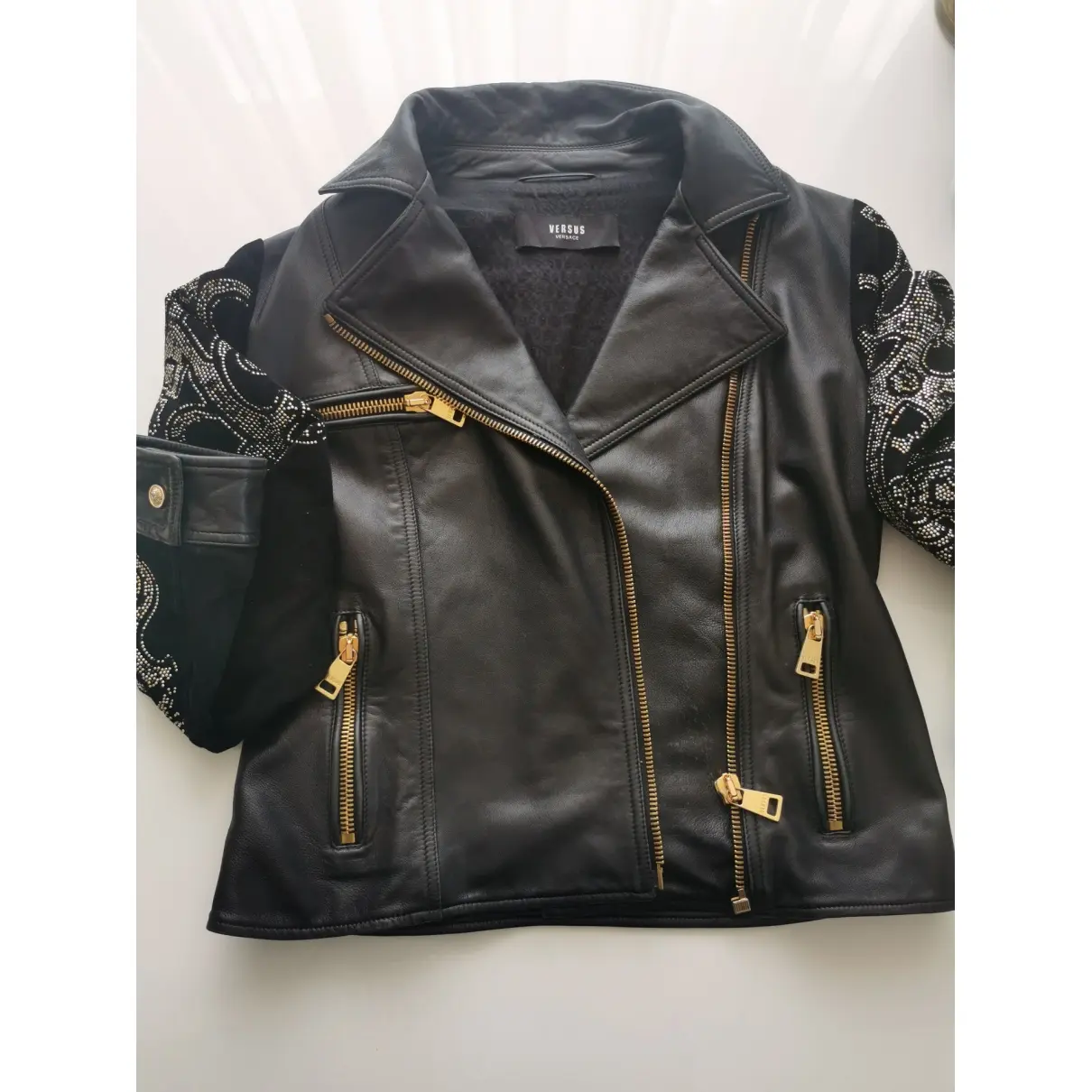 Leather jacket Versus