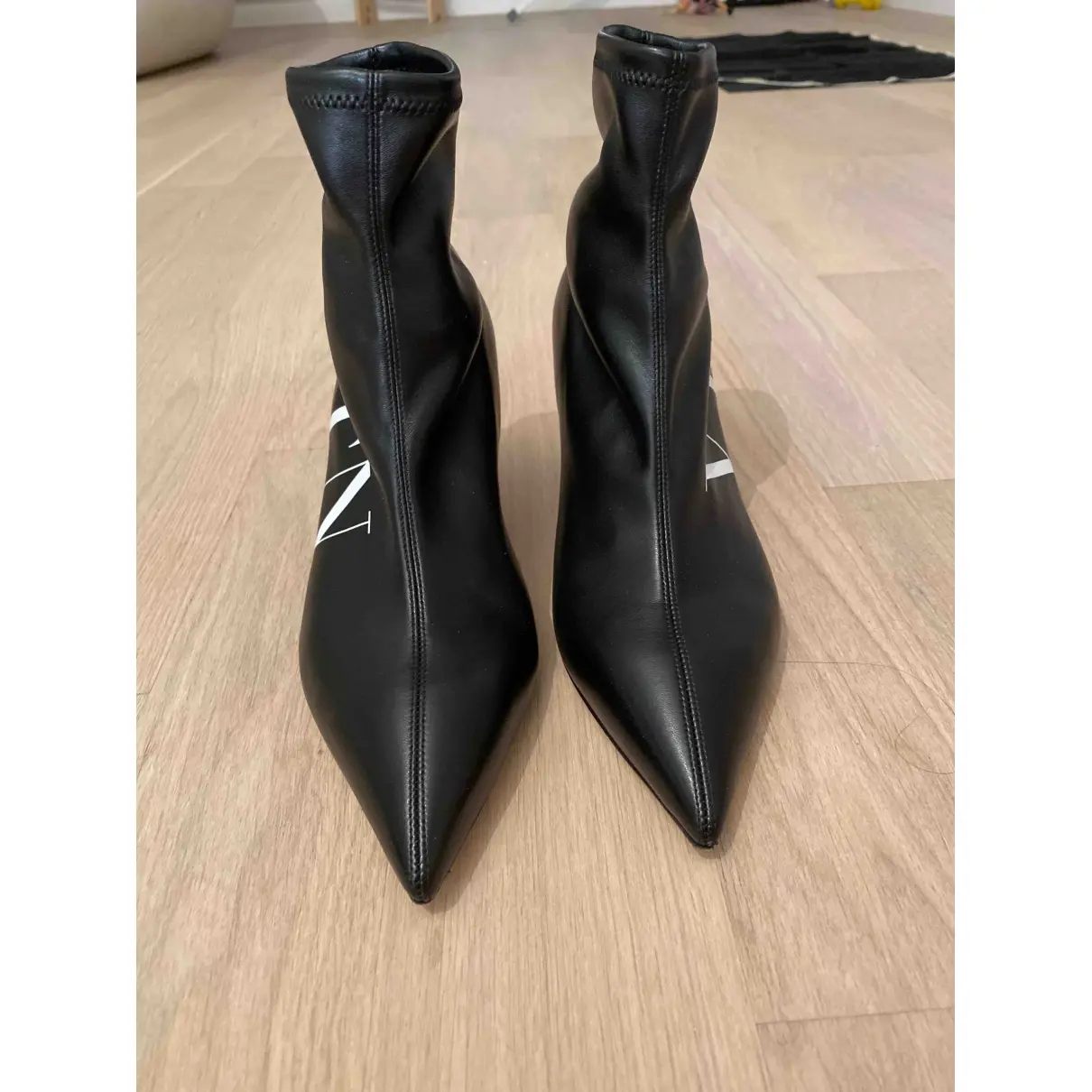 Buy Valentino Garavani VLTN leather ankle boots online