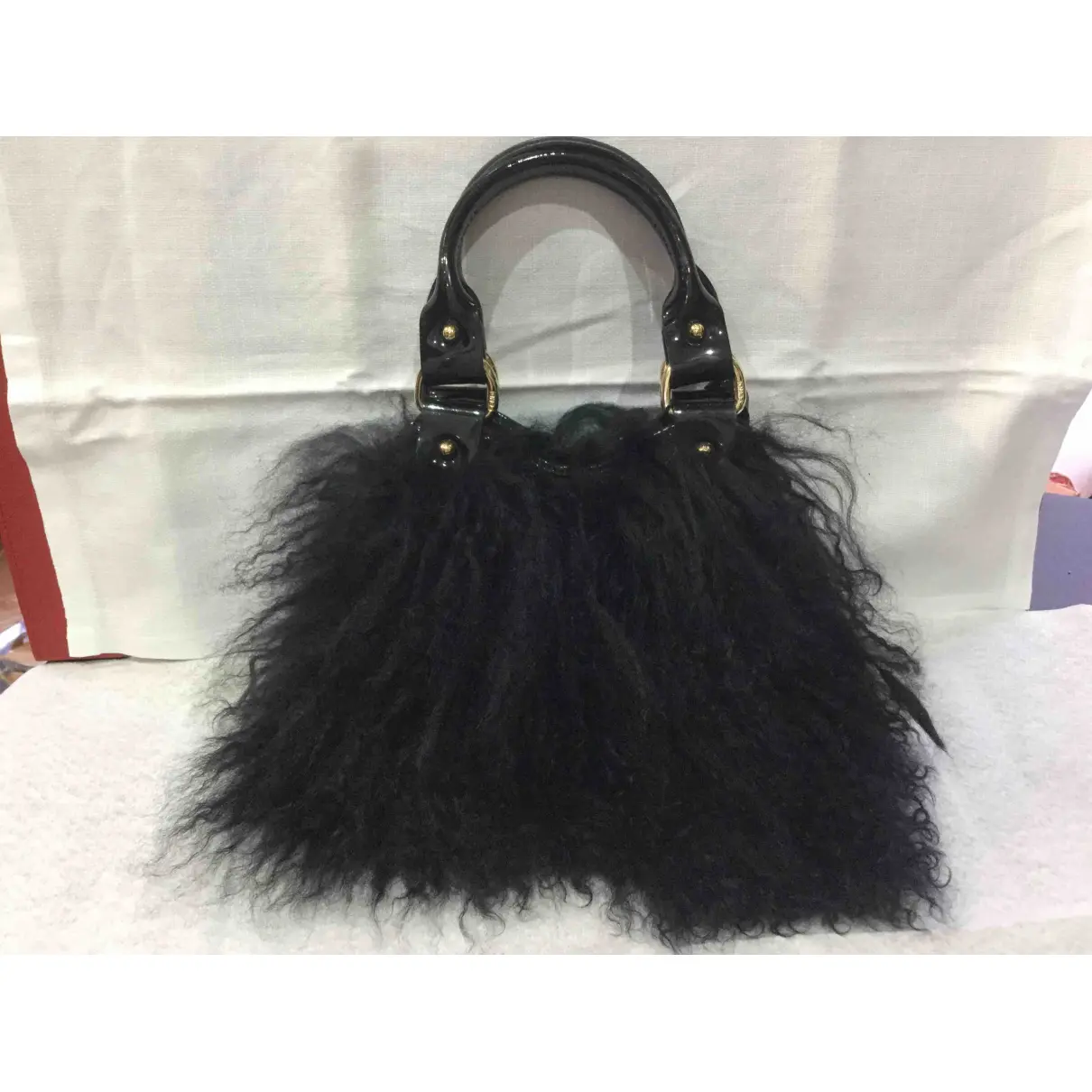 Buy Fendi Mongolian lamb handbag online