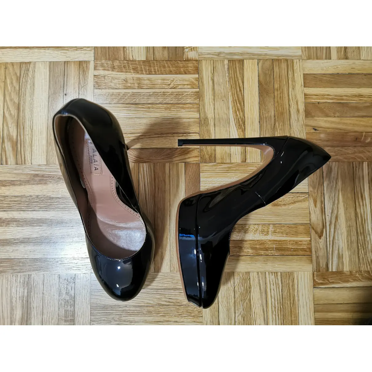 Buy Alaïa Patent leather heels online