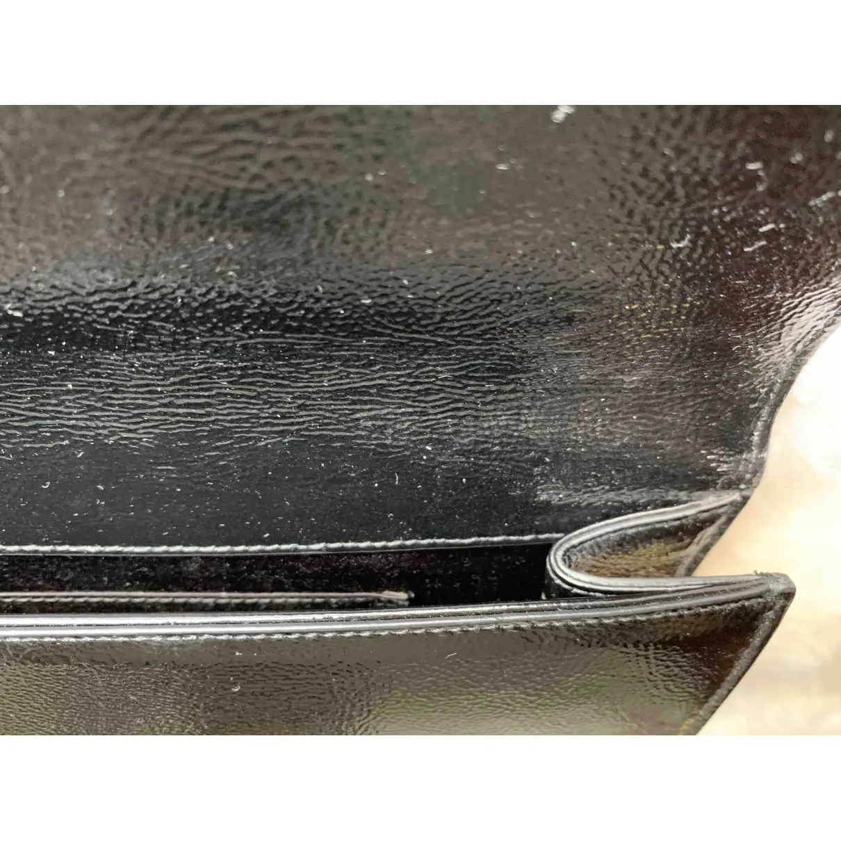 Belle de Jour patent leather clutch bag Yves Saint Laurent