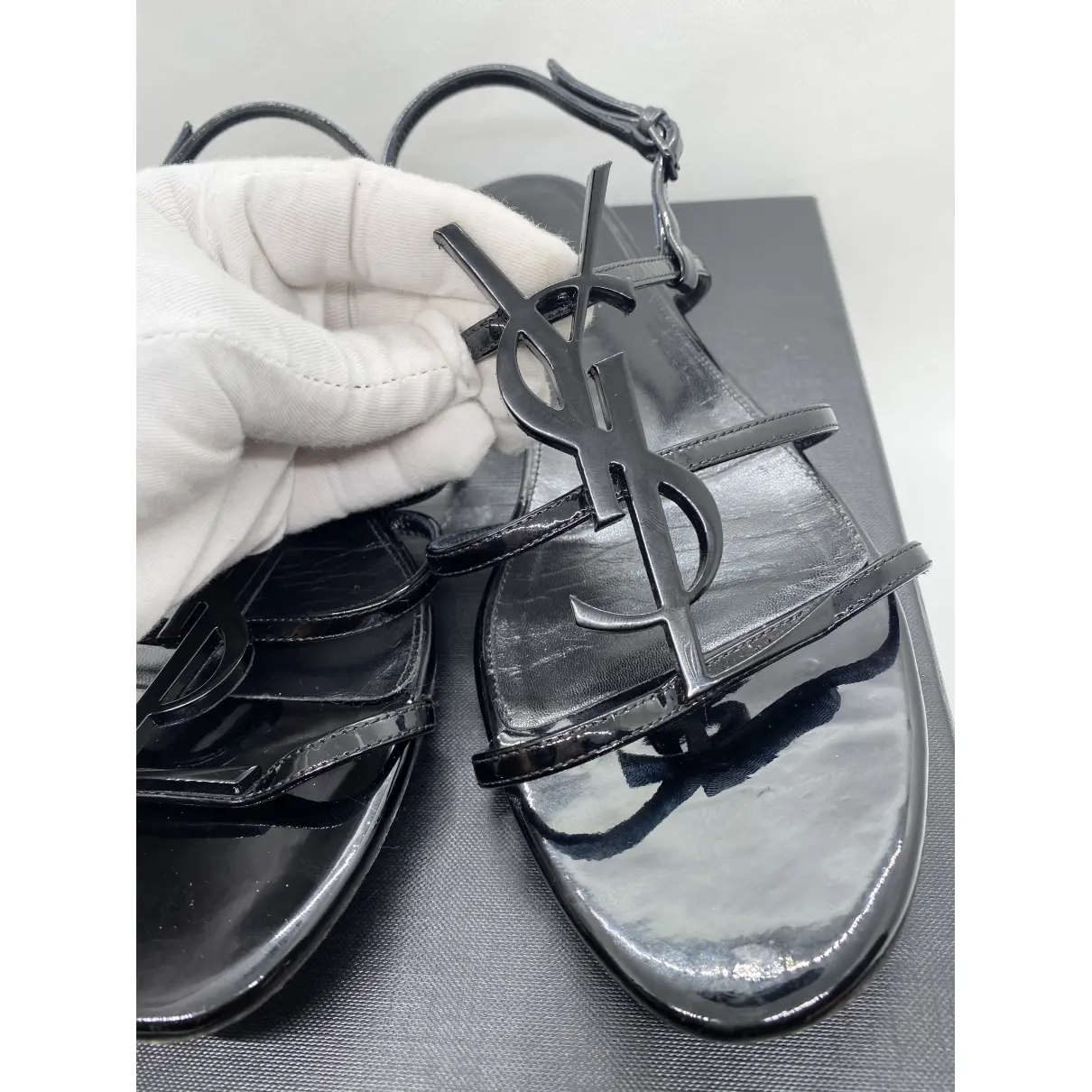 Buy Saint Laurent Cassandra patent leather sandals online
