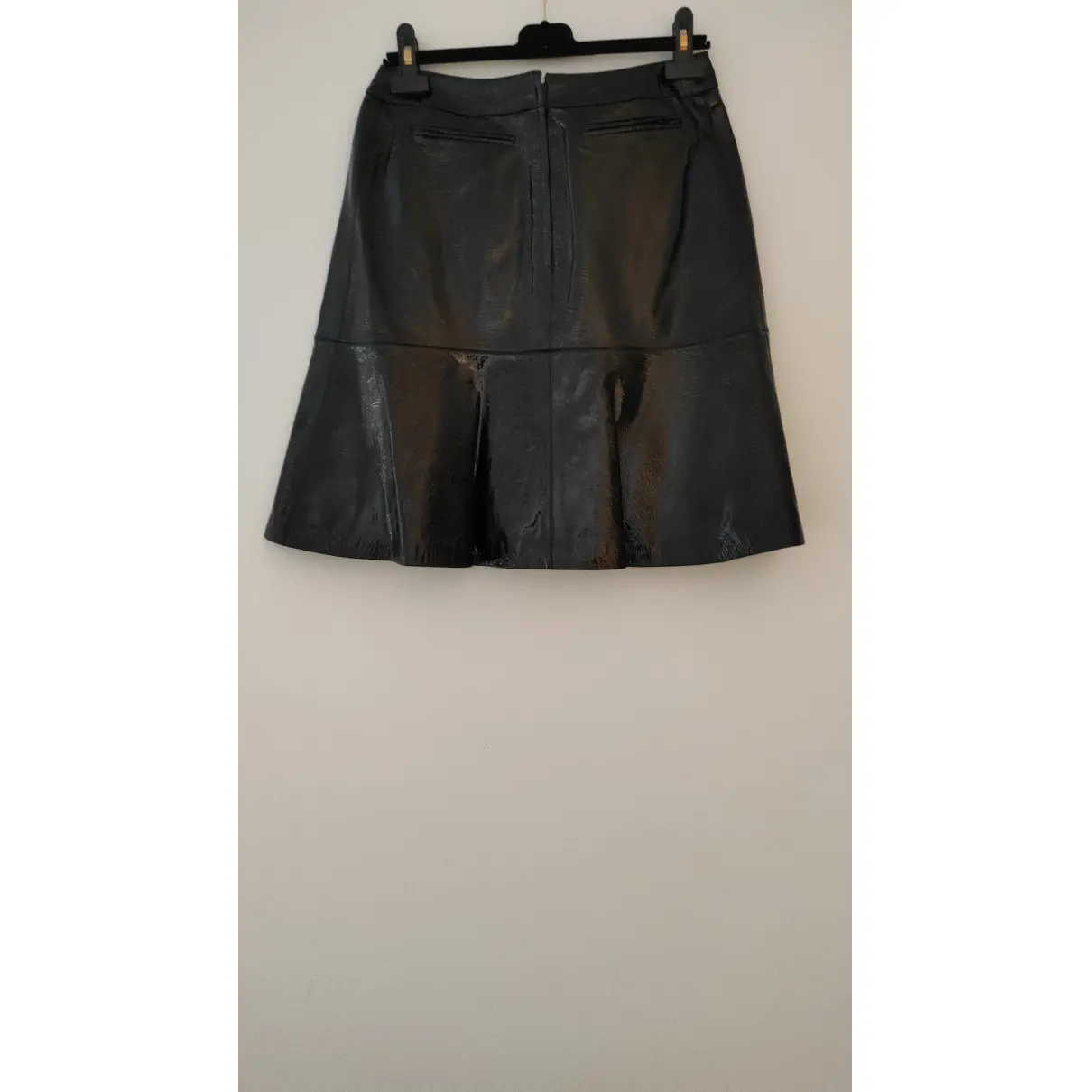 Buy Chanel Patent leather mid-length skirt online - Vintage