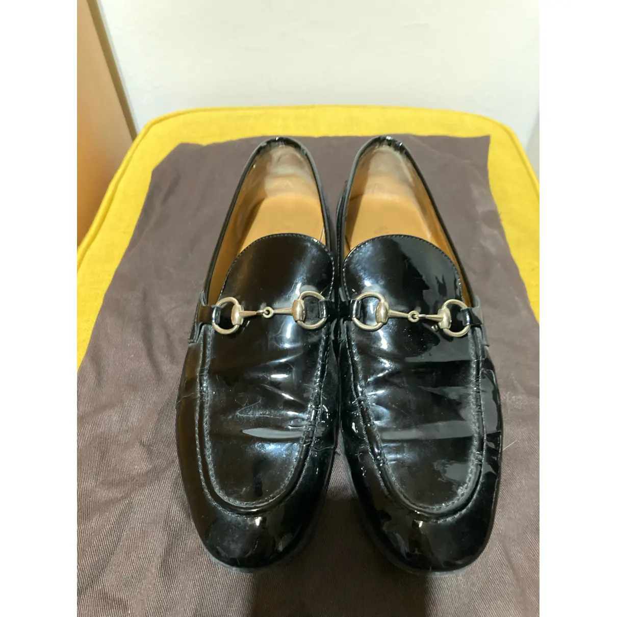 Buy Gucci Jordaan patent leather flats online
