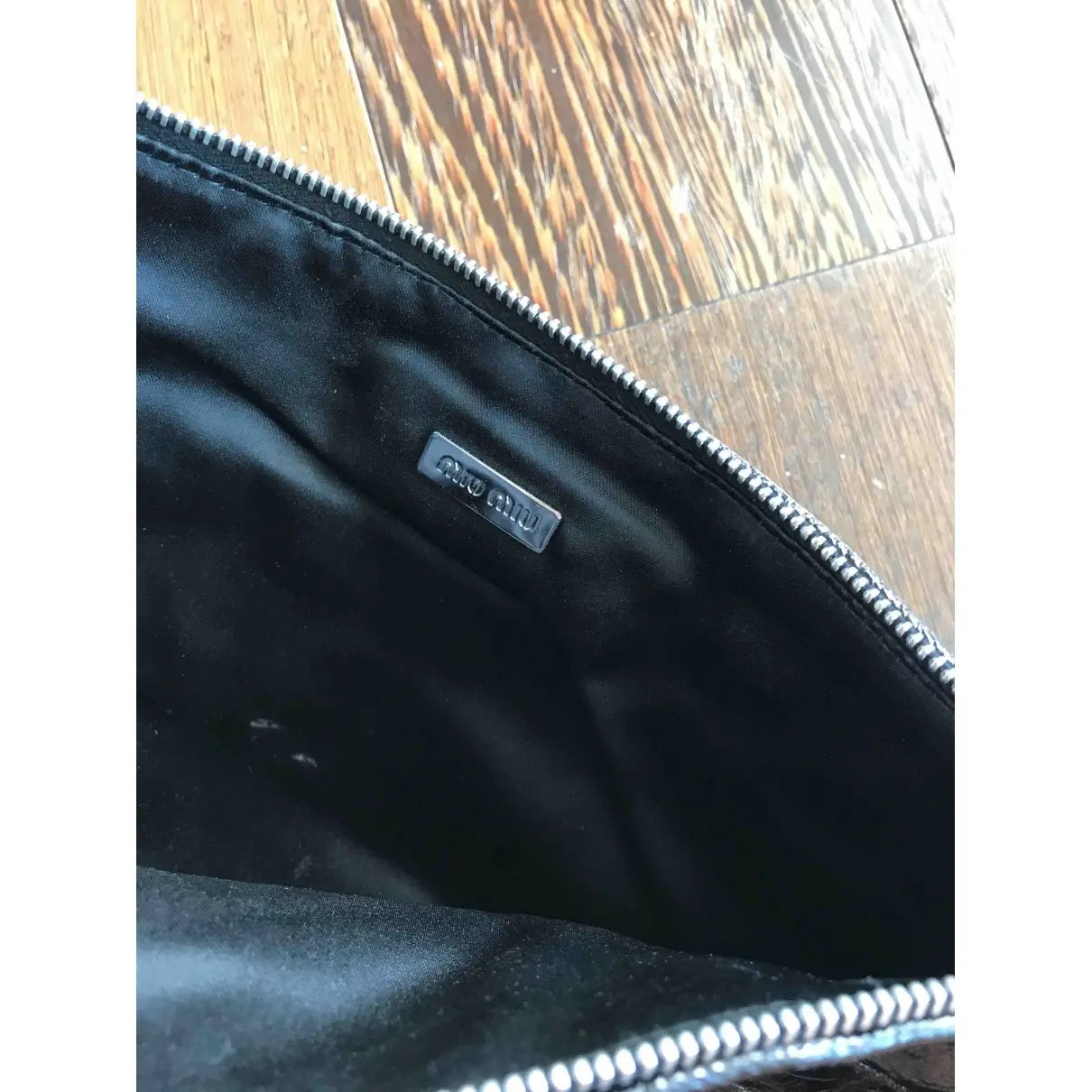 Buy Miu Miu Madras patent leather clutch bag online