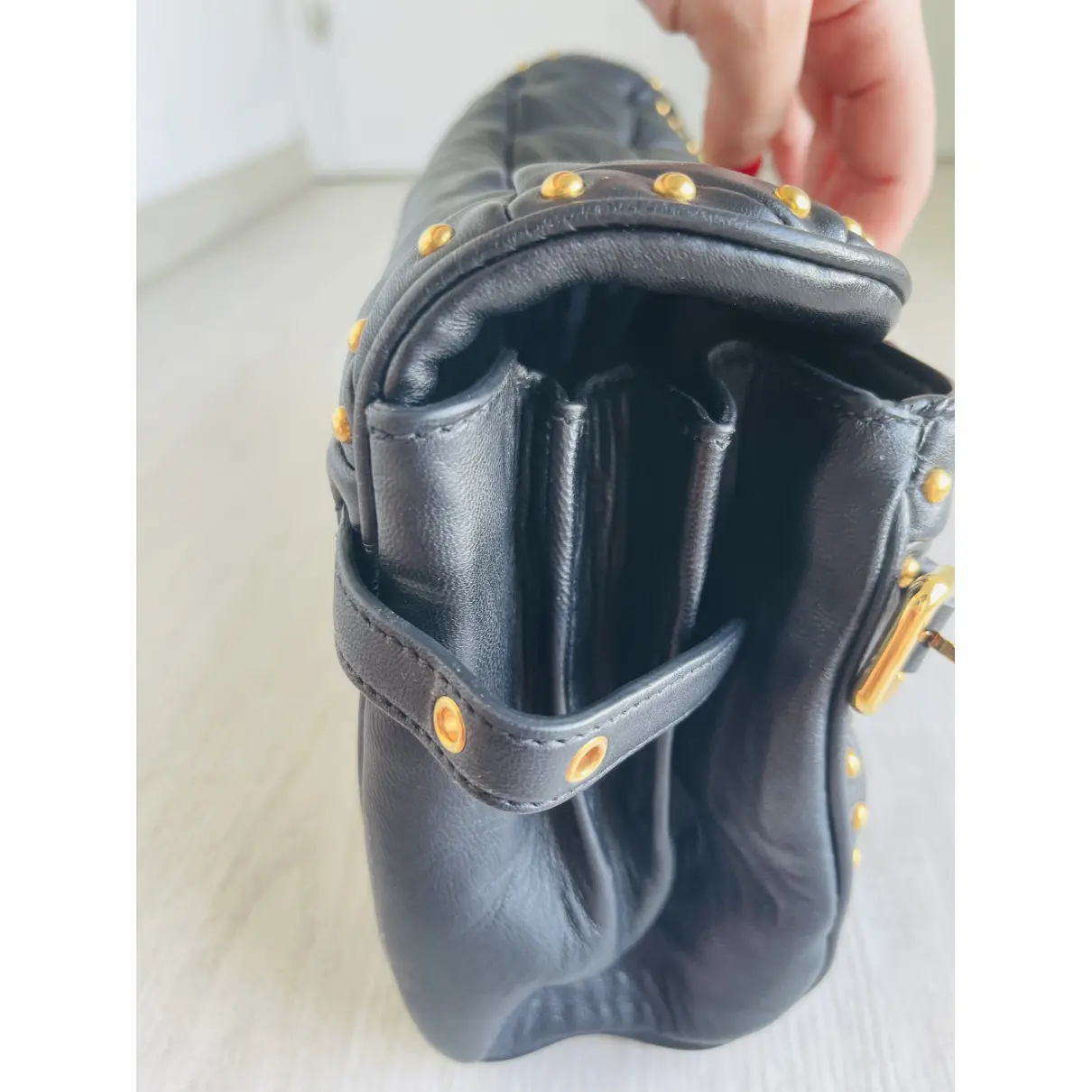 Matelassé patent leather bag Miu Miu