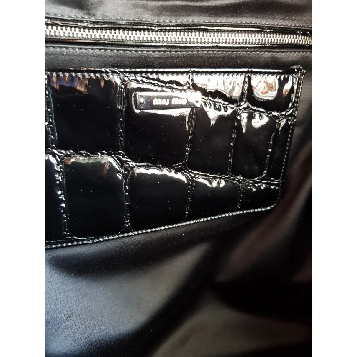 Buy Miu Miu Patent leather backpack online
