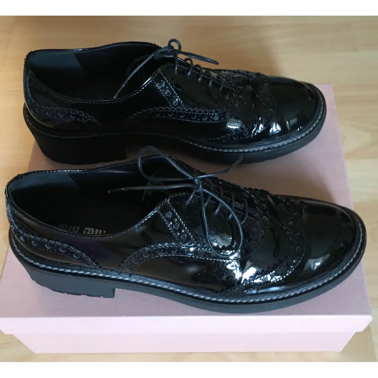 Buy Miu Miu Patent leather lace ups online