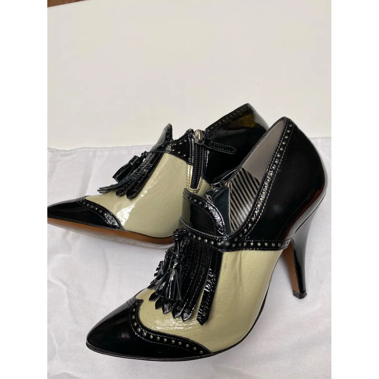 Buy Moschino Patent leather ankle boots online