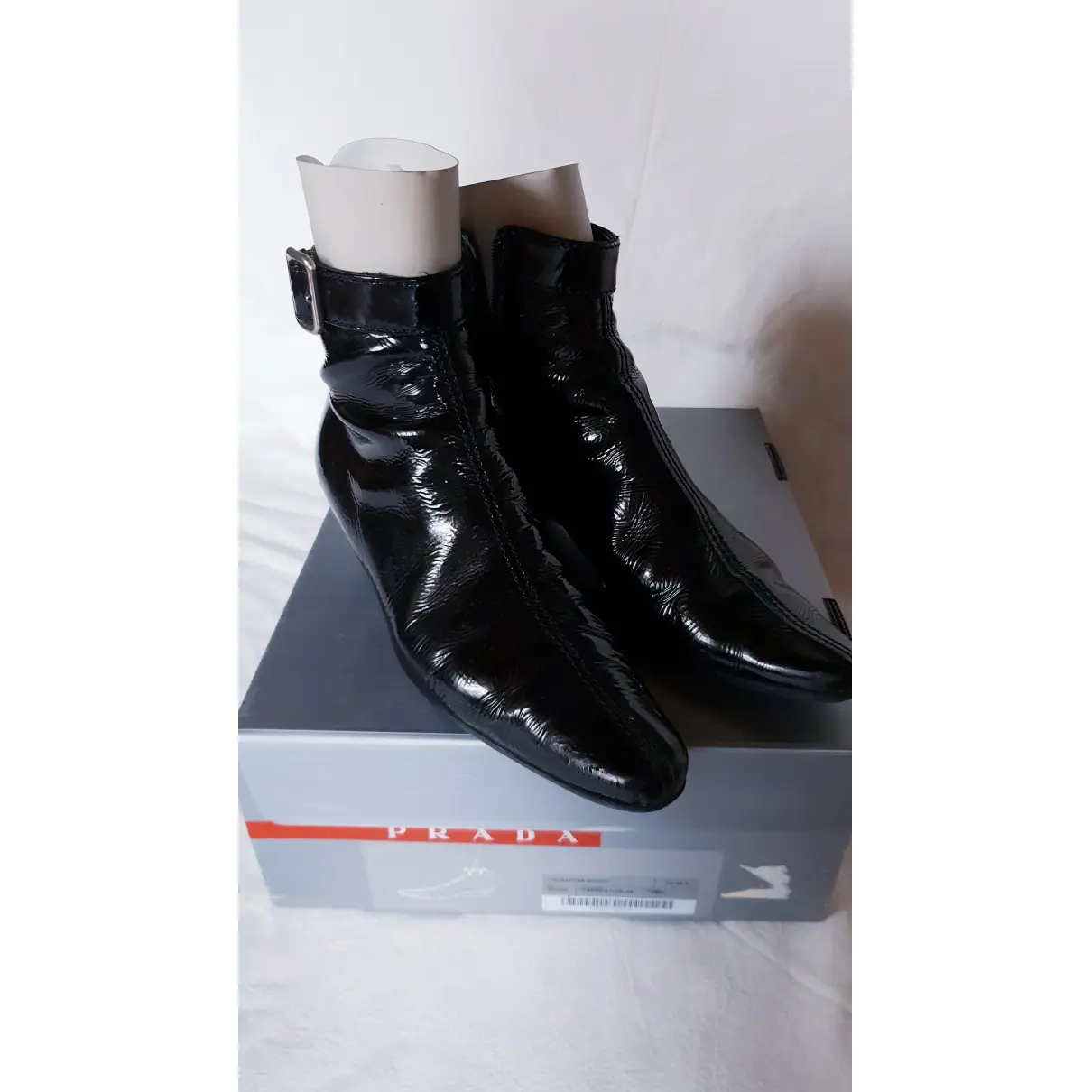 Patent leather biker boots Prada