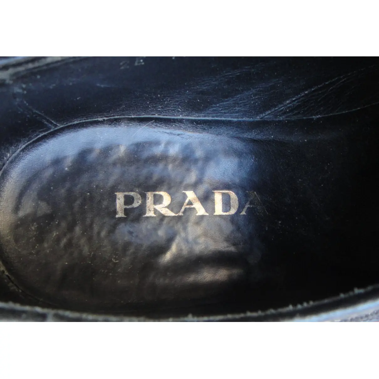 Patent leather lace ups Prada