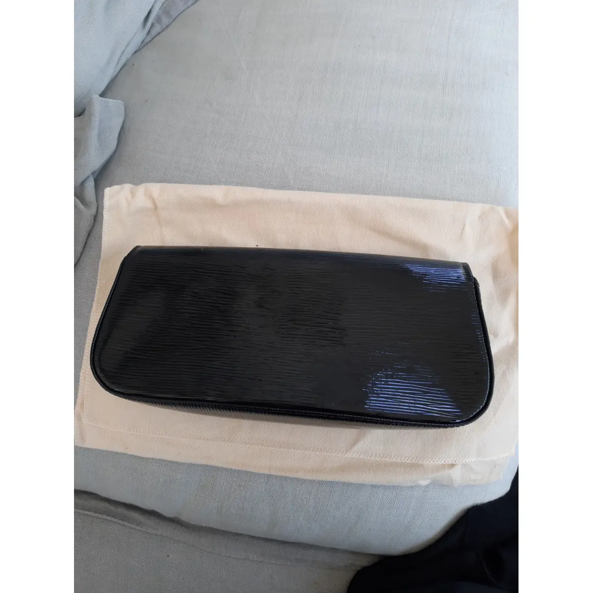 Buy Louis Vuitton Sobe patent leather clutch bag online
