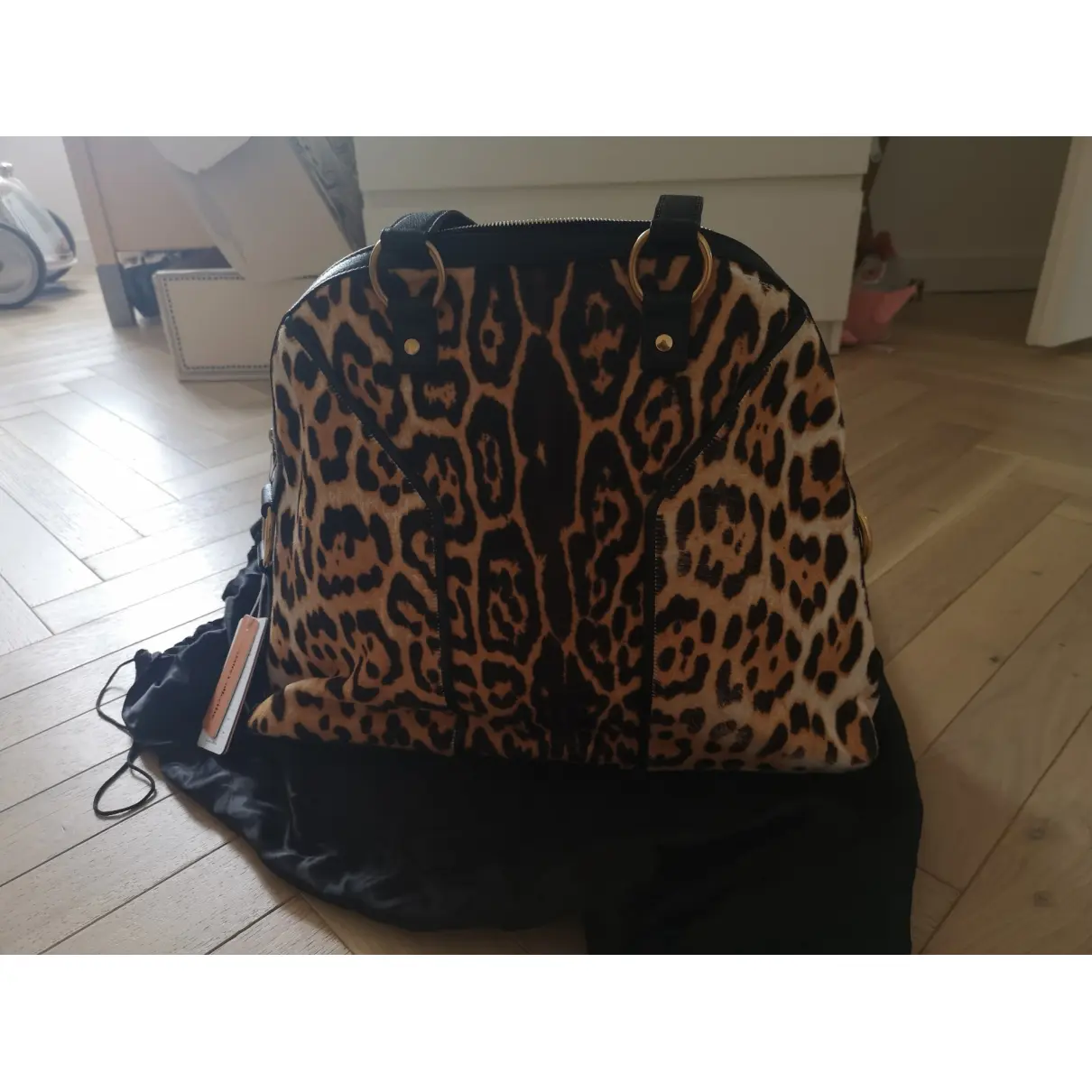 Buy Yves Saint Laurent Muse pony-style calfskin handbag online