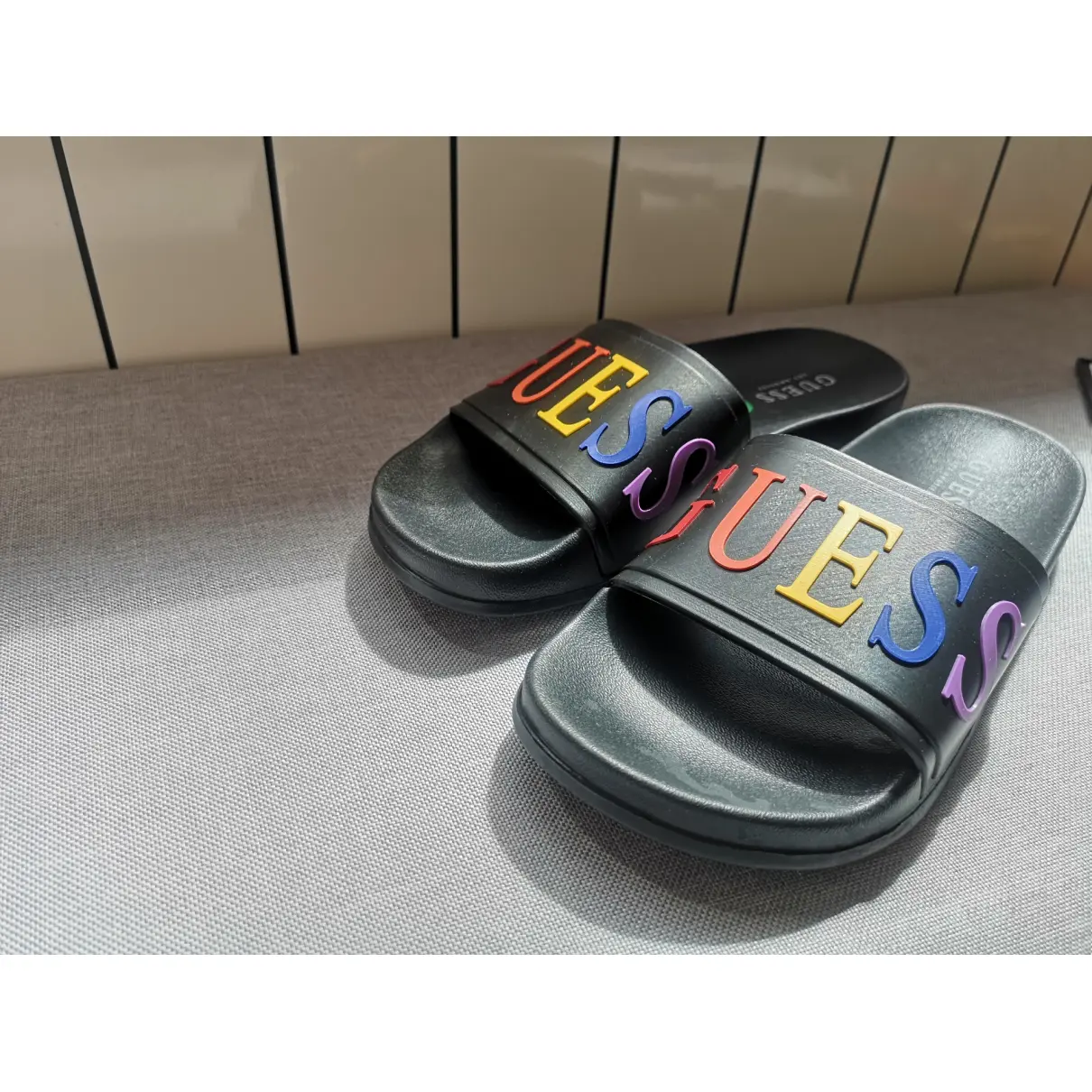 Buy GUESS Flip flops online