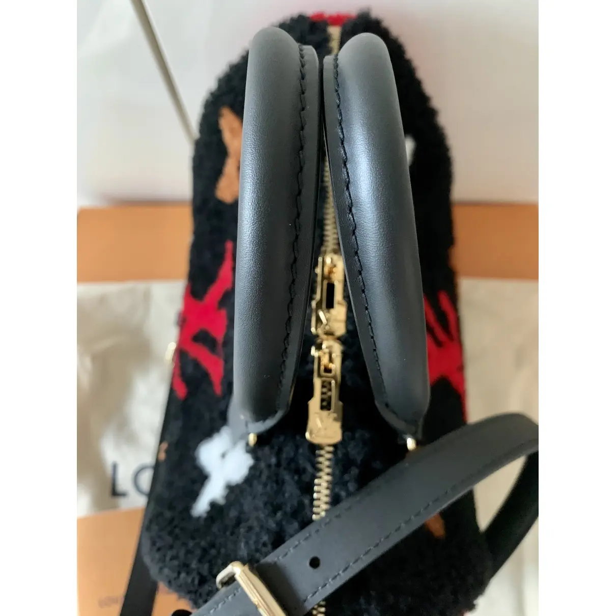 Buy Louis Vuitton Speedy Bandoulière shearling handbag online