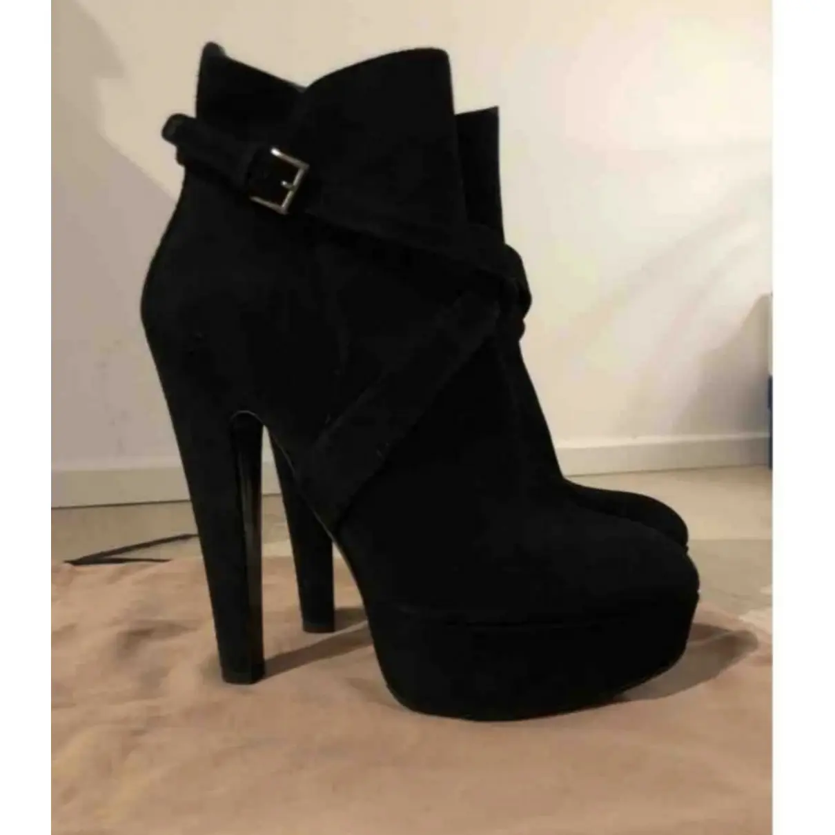 Buy Alaïa Buckled boots online