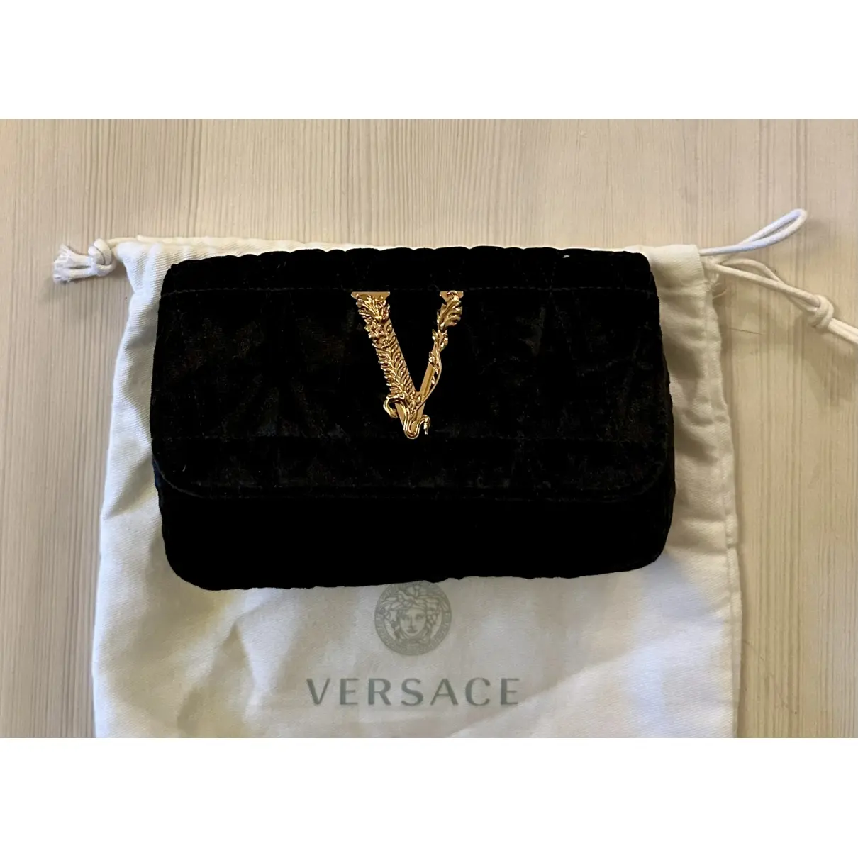 Buy Versace Virtus velvet handbag online