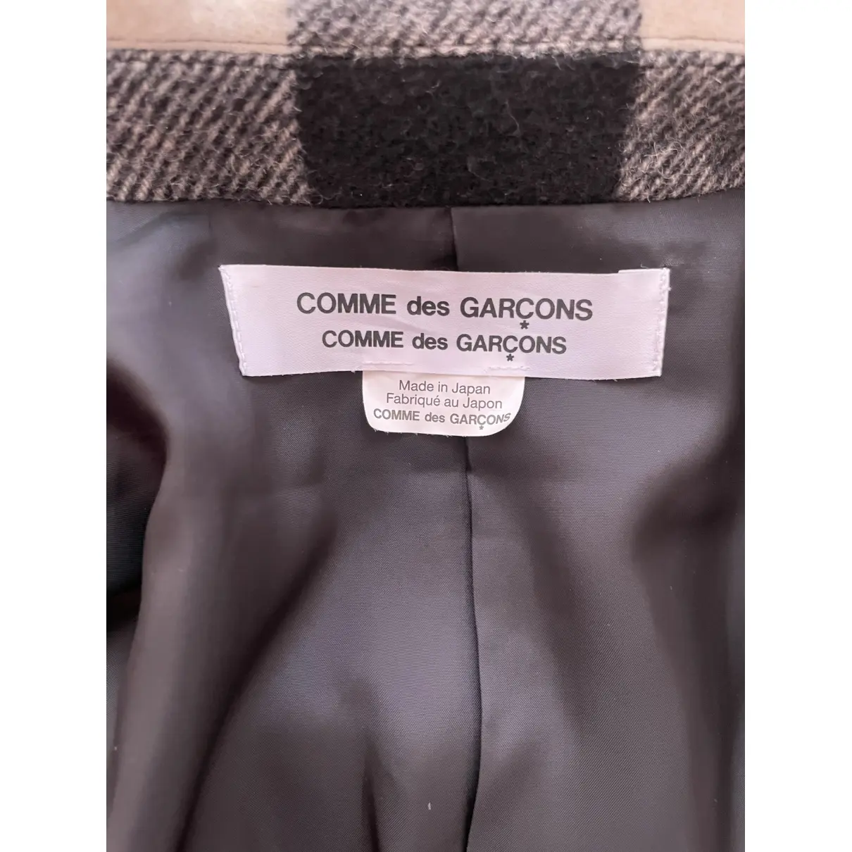 Buy Comme Des Garcons Wool coat online