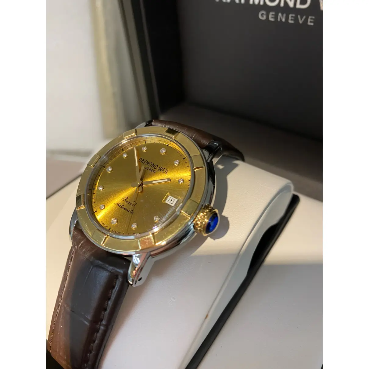 Yellow gold watch Raymond Weil