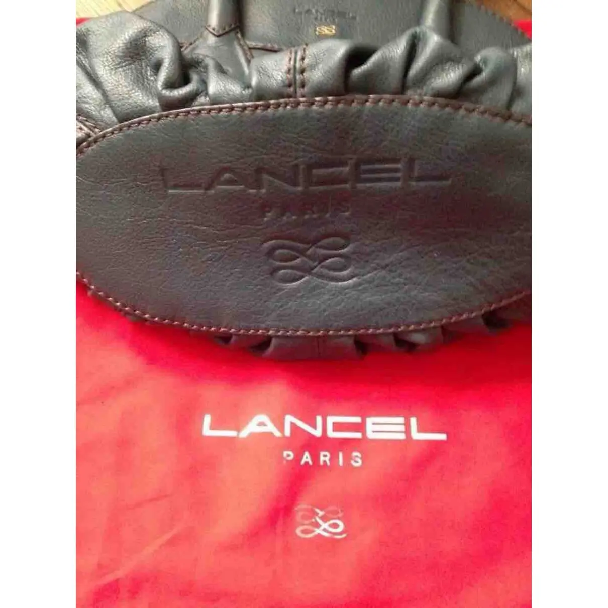 Buy Lancel Gousset leather handbag online