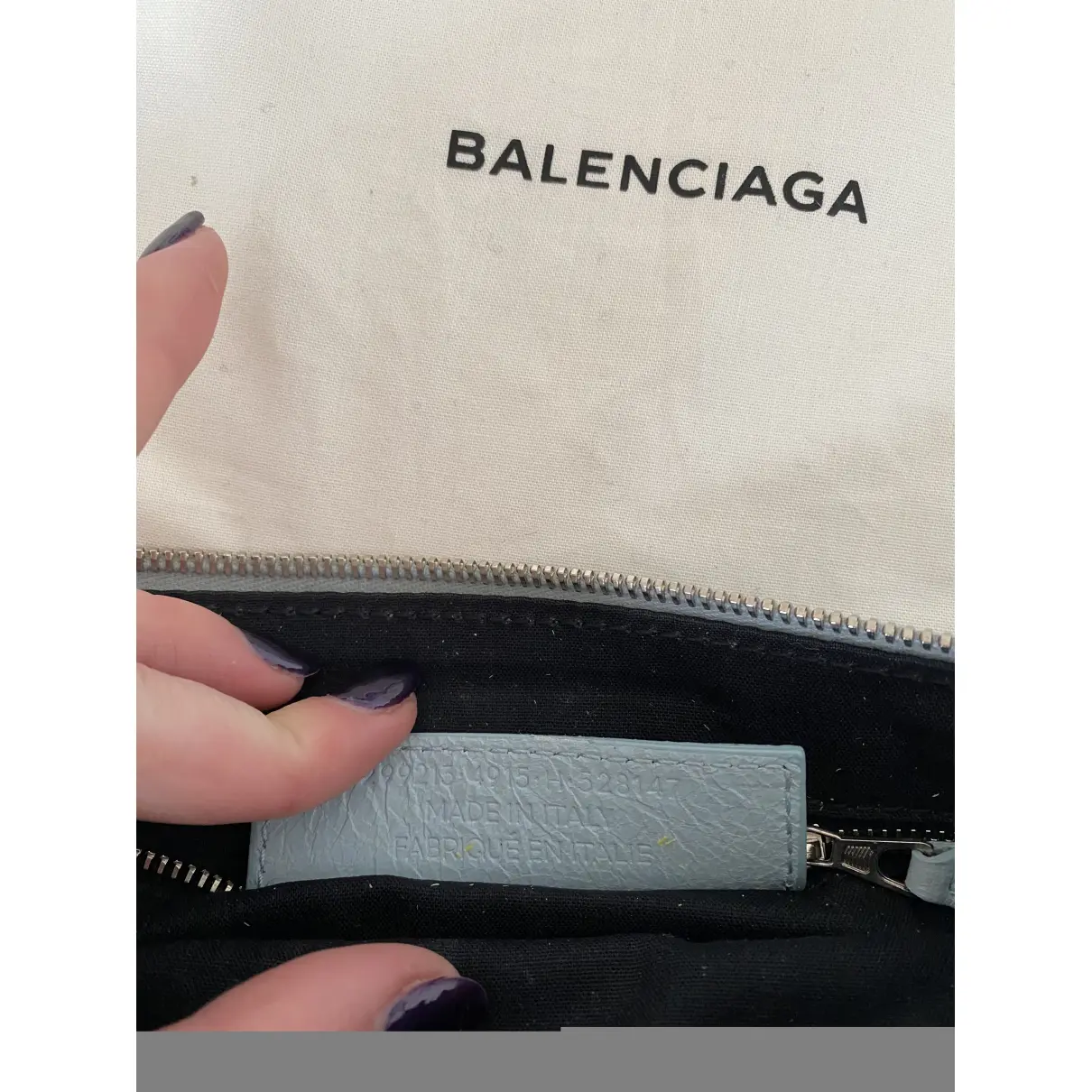 Buy Balenciaga City Clip leather clutch bag online