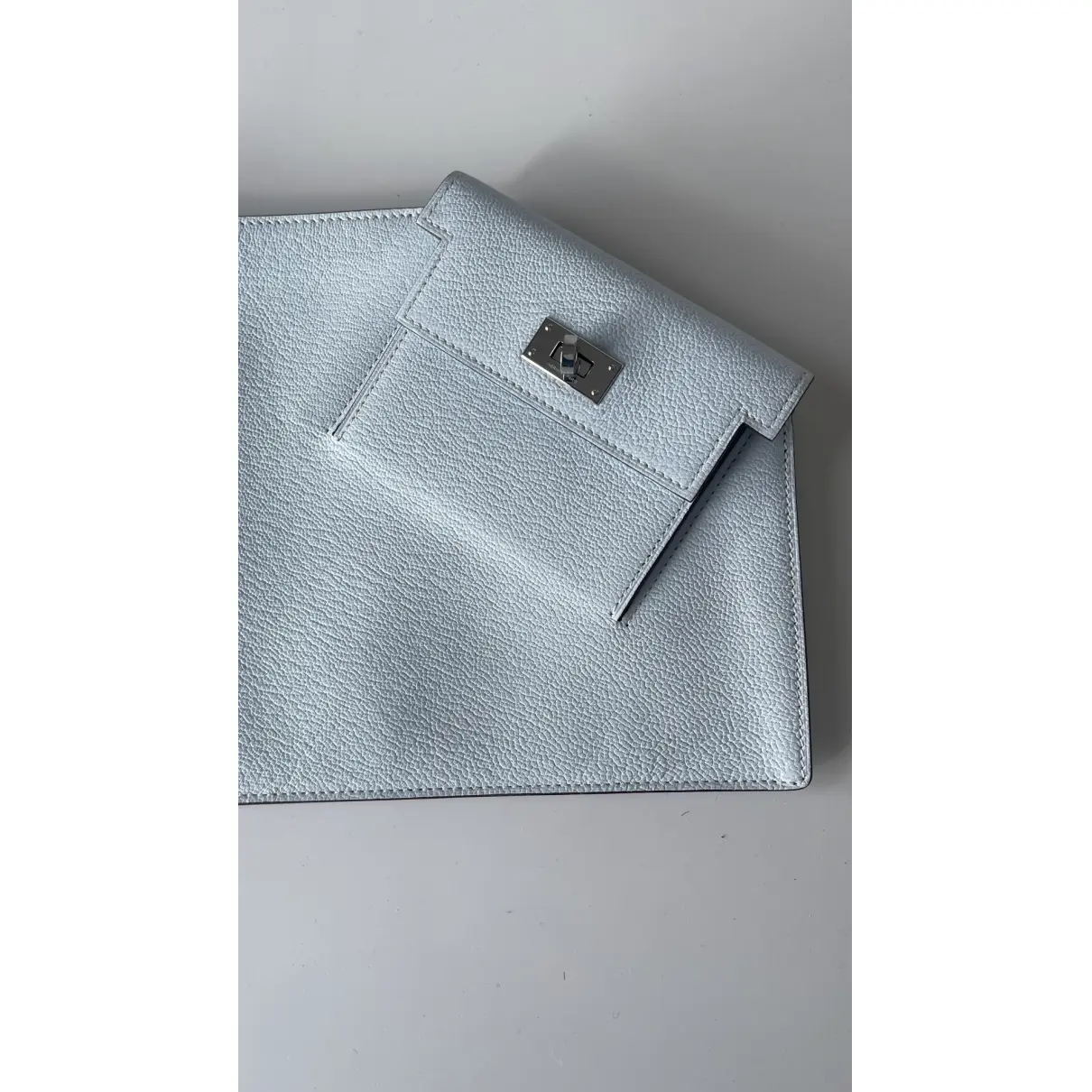 Buy Hermès Kelly Pocket To Go leather clutch bag online