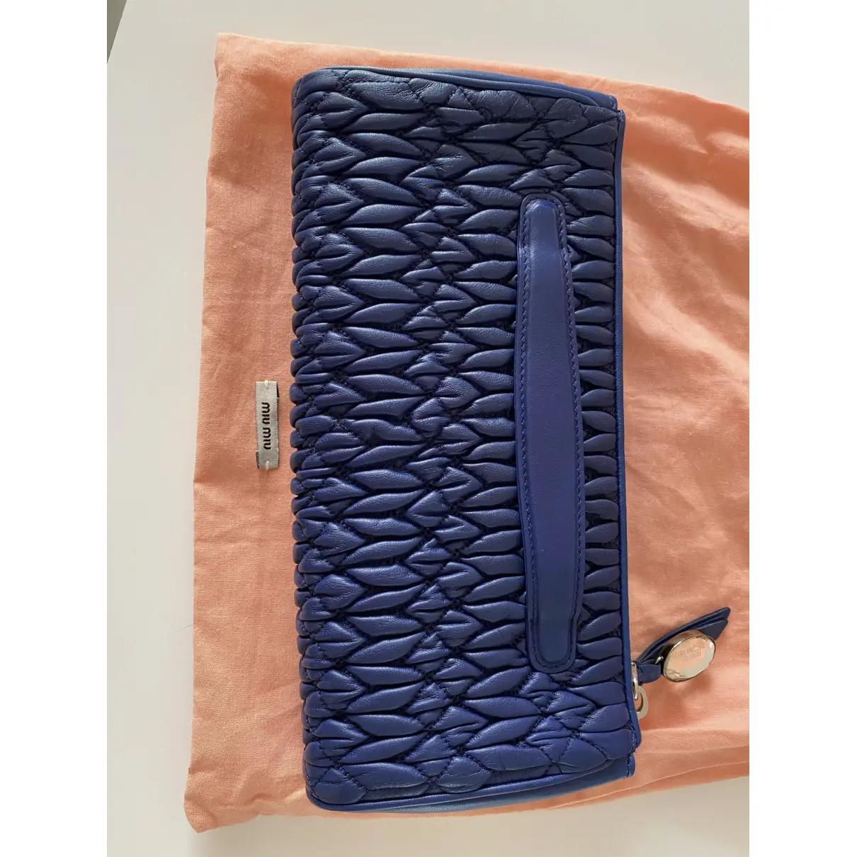 Buy Miu Miu Matelassé leather clutch bag online