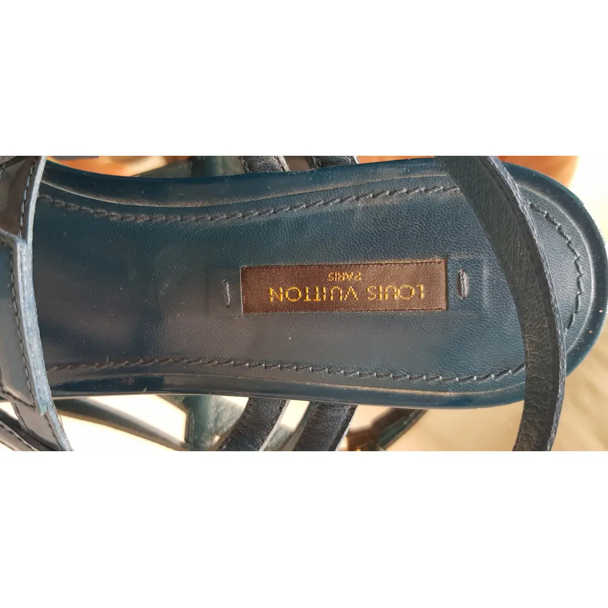 Patent leather flip flops Louis Vuitton