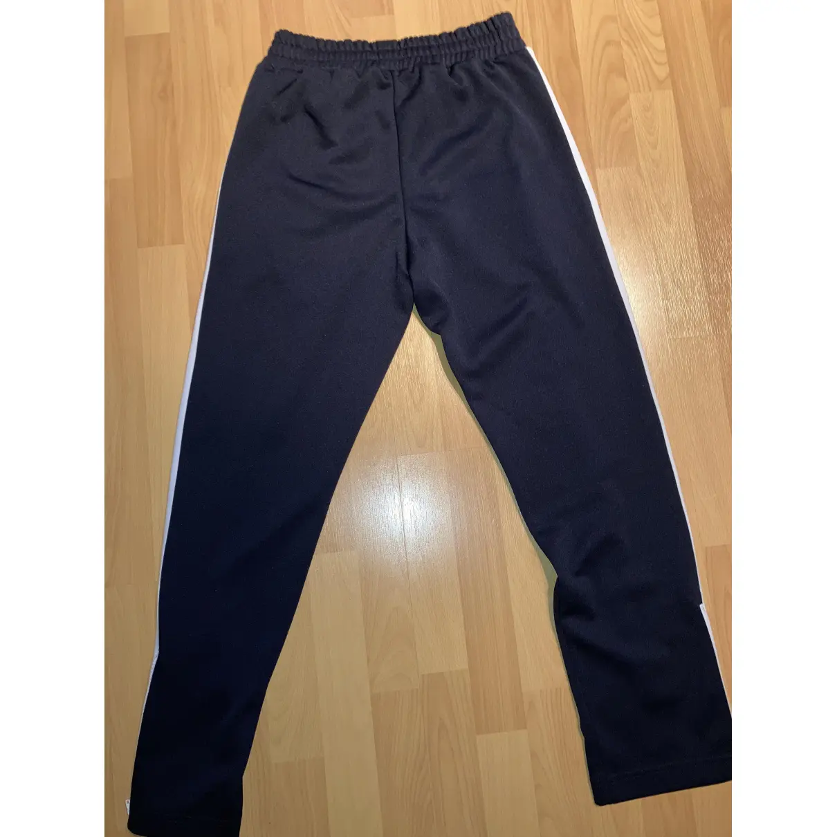 Buy Palm Angels Trousers online