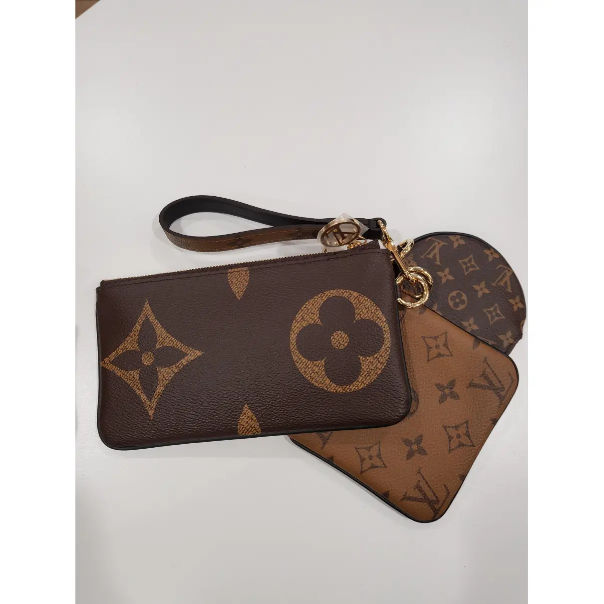 Buy Louis Vuitton Trio pouch cloth clutch bag online