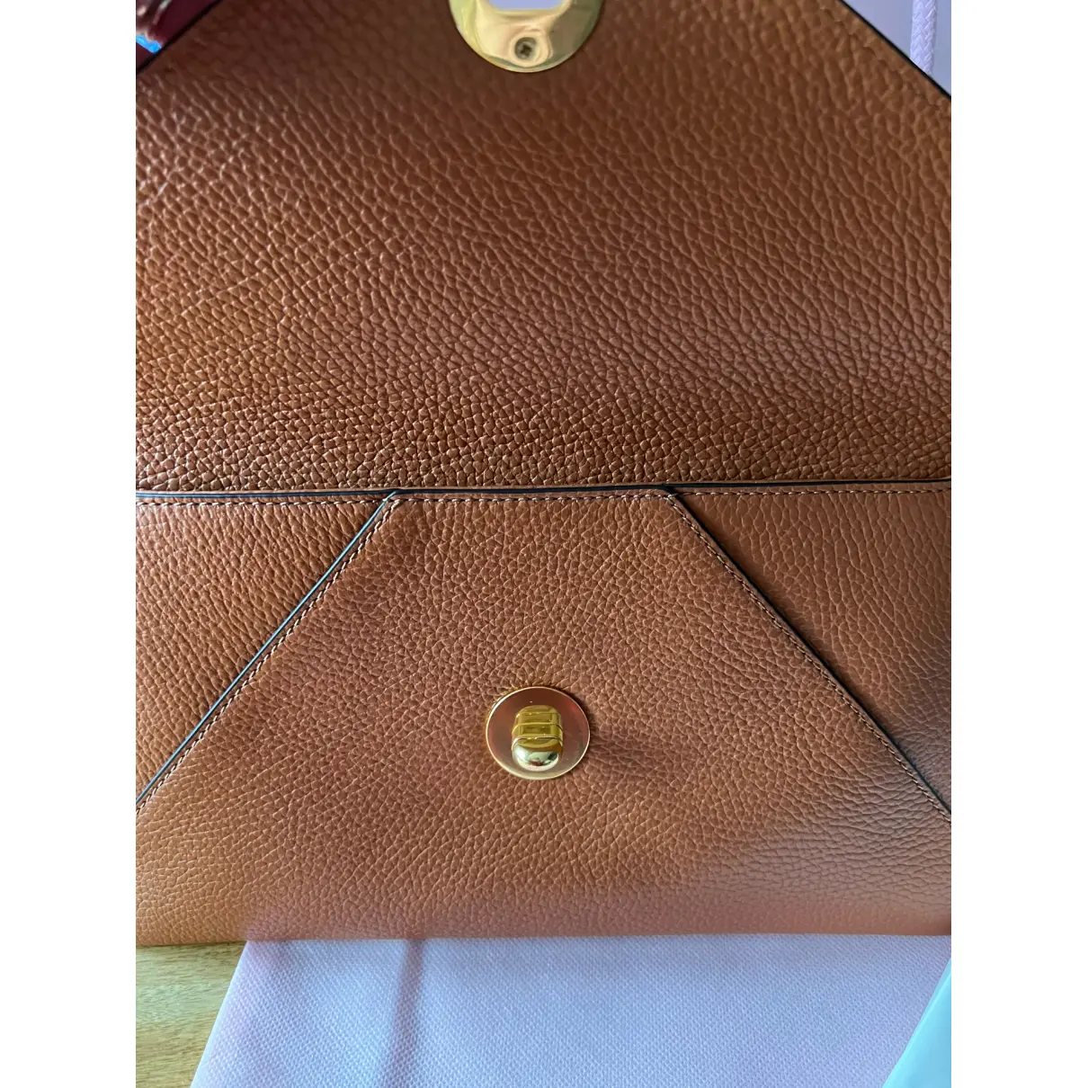 Leather clutch bag Coccinelle
