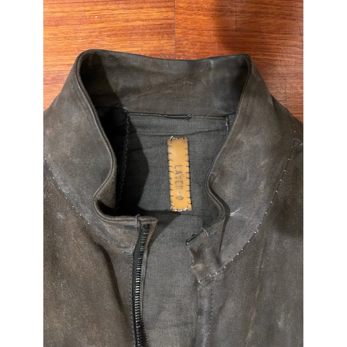 Leather vest Layer-0