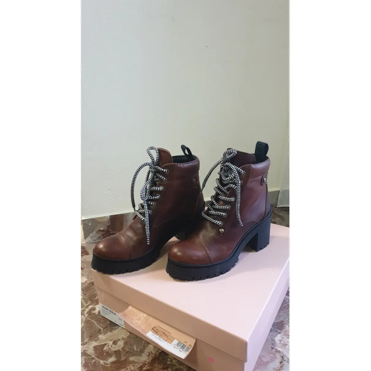 Buy Miu Miu Leather lace up boots online
