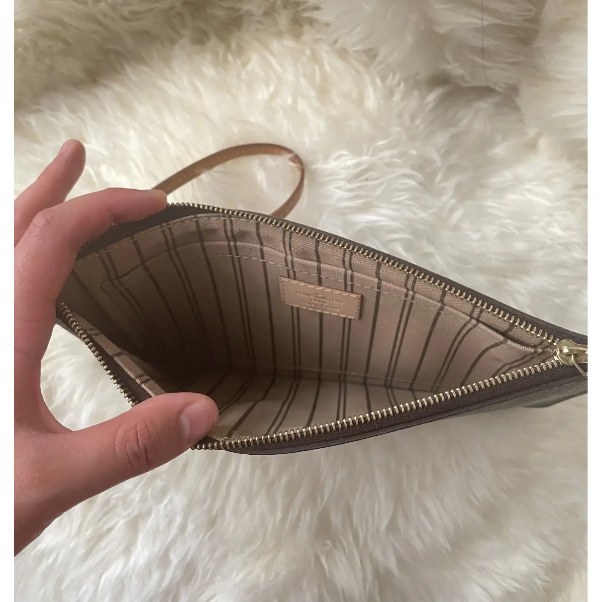 Neverfull leather clutch bag Louis Vuitton