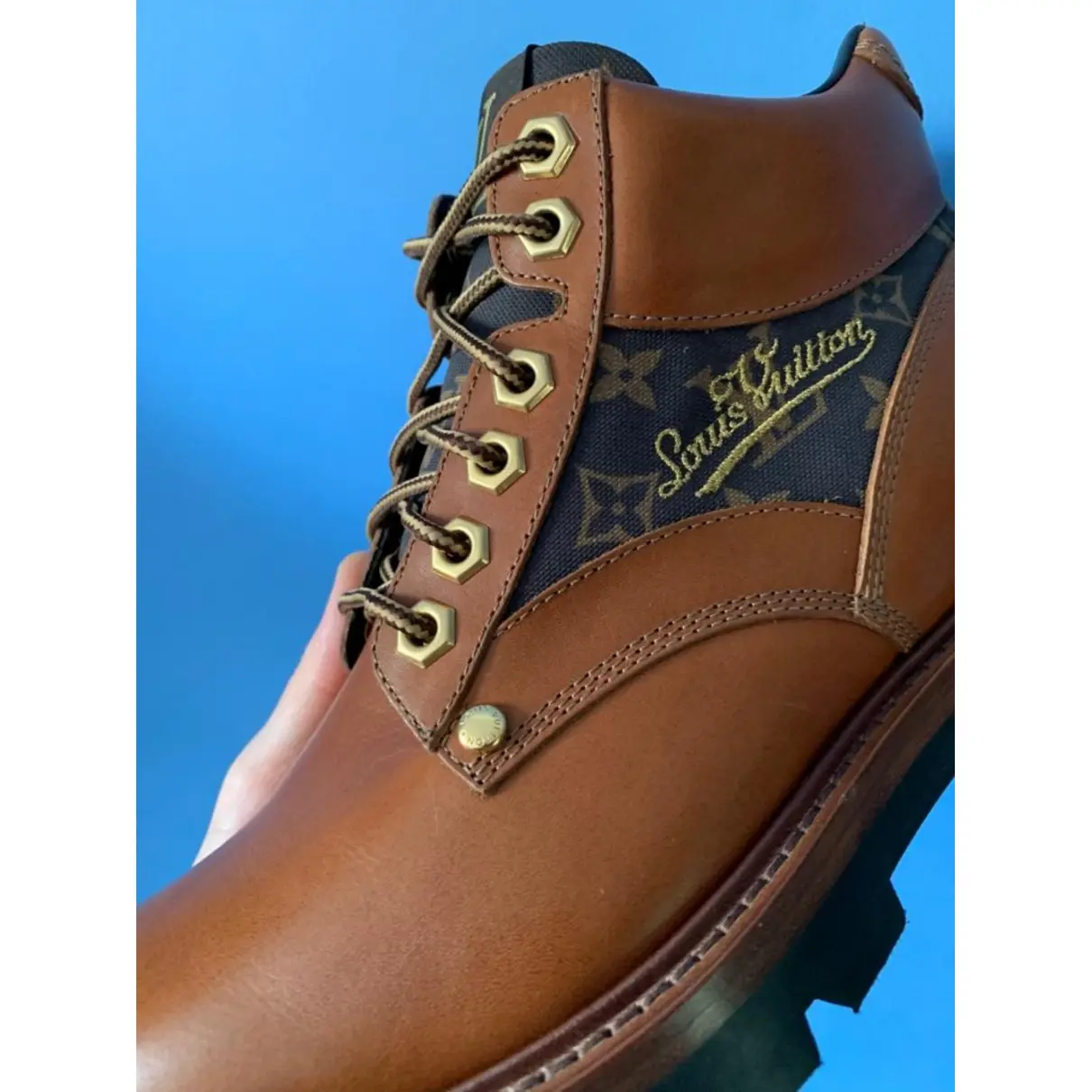 Buy Louis Vuitton Oberkampf leather boots online