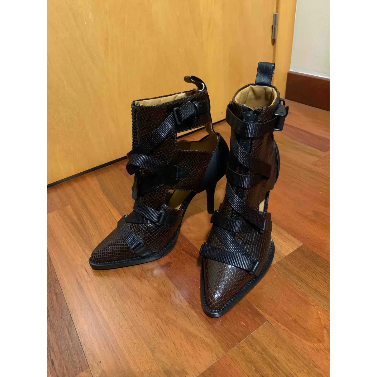 Buy Chloé Tracy leather buckled boots online