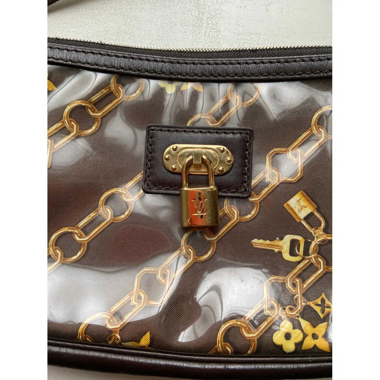 Buy Louis Vuitton Pochette Accessoire vegan leather clutch bag online