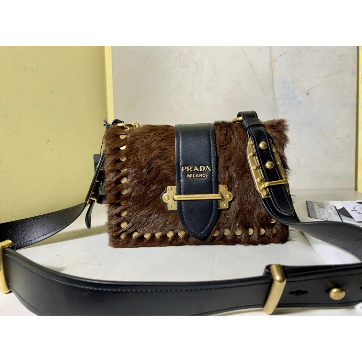 Buy Prada Cahier faux fur crossbody bag online